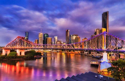 Story bridge across Brisbane river in Brisbane city CBD at sunrise.