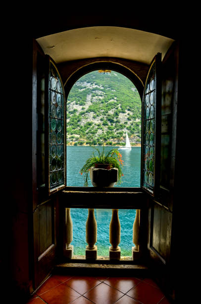 istock Open window with sea and mountain views 1360154560