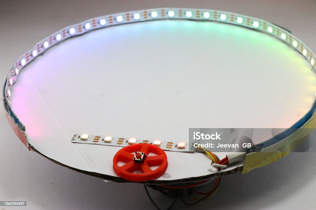 RGB LED strip light game controlled by single push button switch with levels, Creative idea with ARGB LED light strips Cut Out Stock Photo