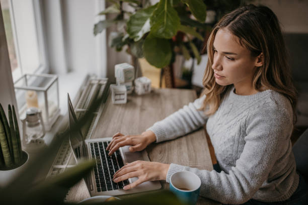 istock Woman working on laptop 1360155719