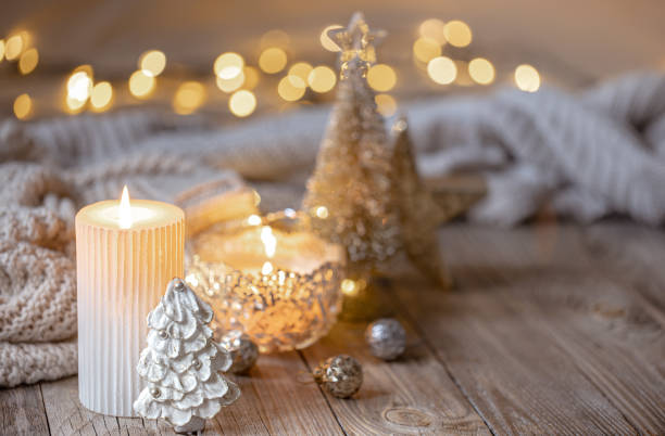 istock Christmas background with burning candle and decor details. 1360155754