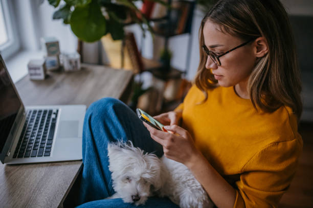 istock Young woman using smart phone 1360157142