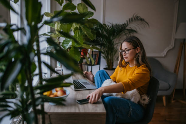 istock Woman working at home 1360157178