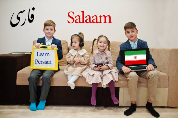 istock Four kids show inscription learn persian. Foreign language learning concept. Salaam Iran. 1360157325