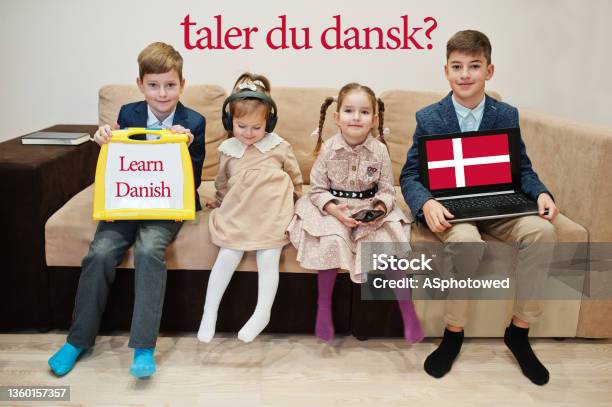 Four Kids Show Inscription Learn Danish Foreign Language Learning Concept Taler Du Dansk Stock Photo - Download Image Now