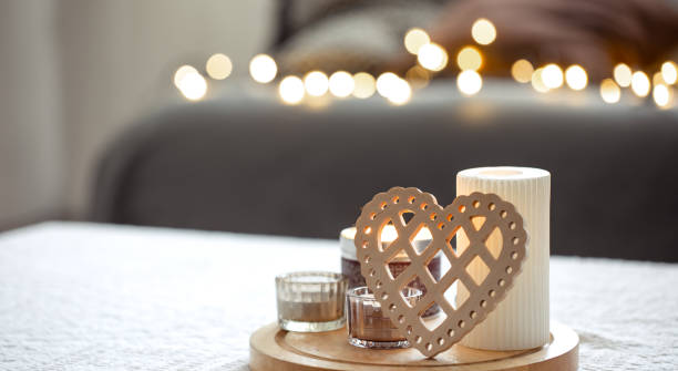 istock Cozy background for Valentine's Day with decorative heart and candles. 1360158749
