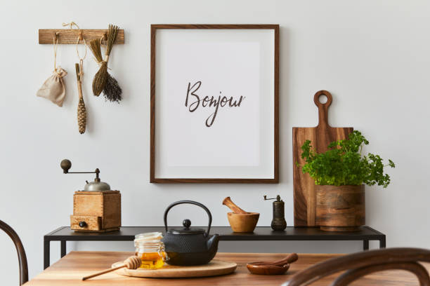 istock Creative dining room interior design with mock up poster frame, family dining table, black console and retro inspired personal accessories. Copy space. Template. Autumn vibes.