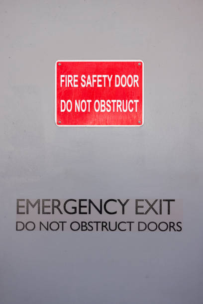 istock Red fire safety door sign 1360160399