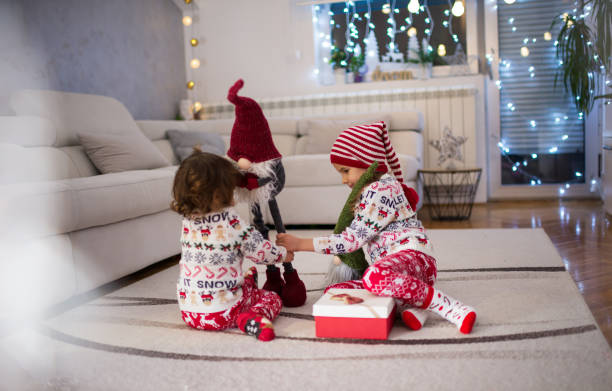 istock Happy children on Christmas Eve 1360163895