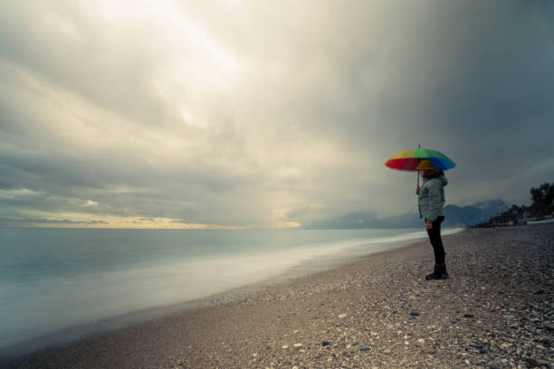 istock Woman Looking At The Sea 1360164714