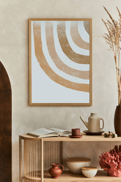 istock Creative composition of living room interior design with console, mock up poster frame, teapot and elegant personal accessories. Copy space. Template. 1360164915