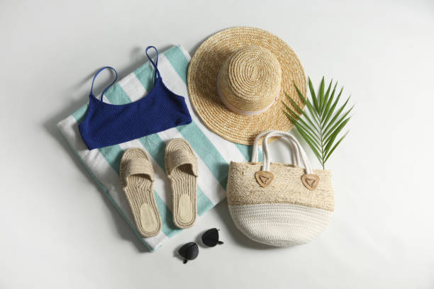 istock Composition with stylish beach accessories on white background, top view 1360169104