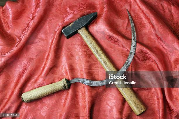 Sickle And Hammer On Beautiful Red Shawl Stock Photo - Download Image Now - Color Image, Communism, Hammer
