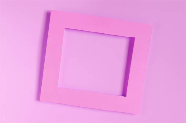istock Lilac paper frame on a colored background. Flat color frame on a lilac background close-up 1360174438