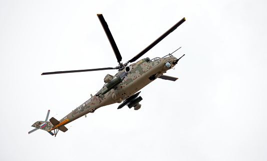The Mil Mi-24 (Hind) is a large helicopter gunship, attack helicopter and low-capacity troop transport with room for eight passengers. It is produced by Mil Moscow Helicopter Plant and has been operated since 1972 by the Soviet Air Force and its successors, along with 48 other nations.