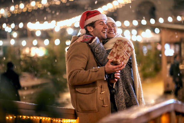 istock Happy couple celebrating New Year together 1360178451