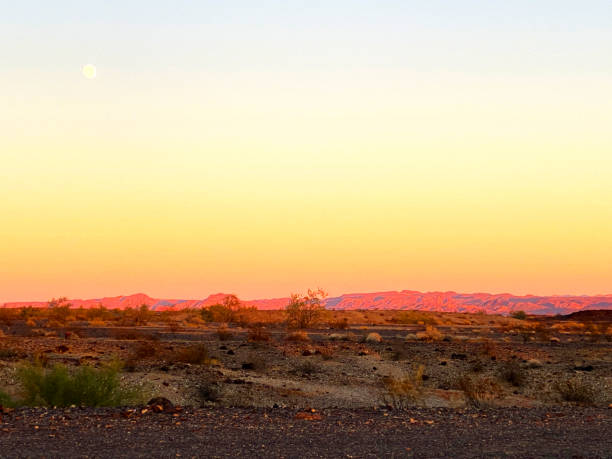 istock western desert mountain range at dusk evening sunset 1360181244