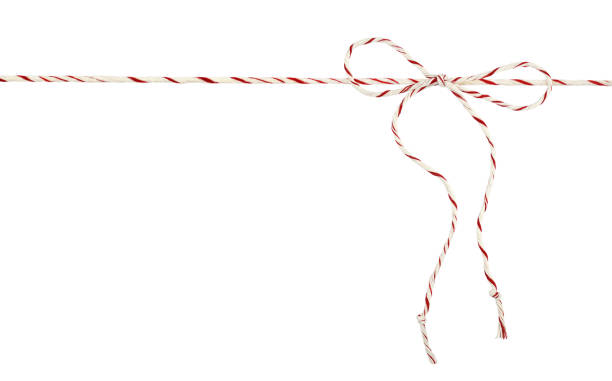 istock White and red Christmas wrapping rope tied in a bow isolated on white 1360181584