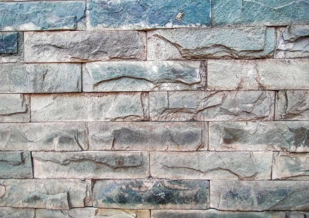 Ancient petroglyphs on the wall in ruins of the medieval fortress. Kharkaroi village, Chechnya (Chechen Republic), Russia, Caucasus