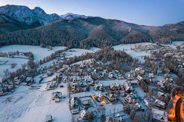 istock Zakopane Cityscape in Winter with Giewont Mountain. Drone View 1360189930