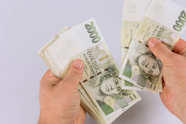 istock Czech koruna CZK banknote is counting in hand 1360192738