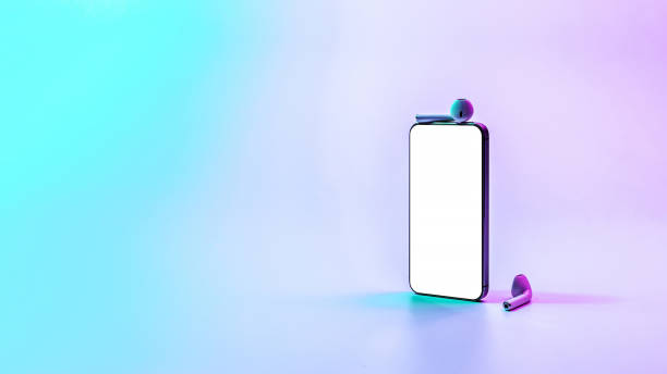 istock Screen mockup. Mobile smartphone technology blank screen. Mock up smart phone device, audio headphones on neon gradient banner. Game design, mobile application presentation or portfolio mockups. 1360193552