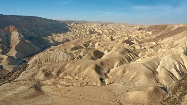 istock Sand dunes in desert area 1360193655