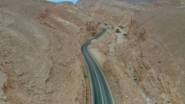 istock Above view on road between the mountain gorge 1360193719