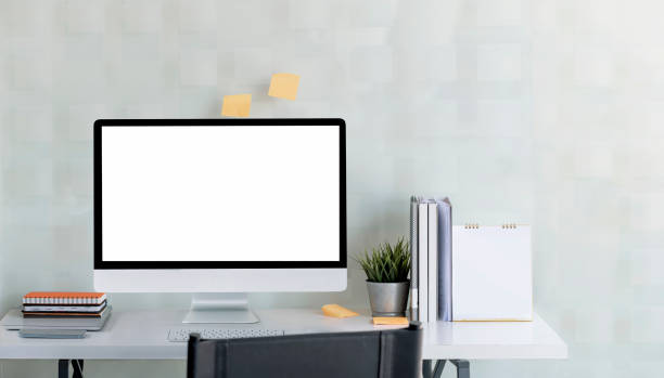 istock Mockup desktop computer monitor on white top table. 1360193930