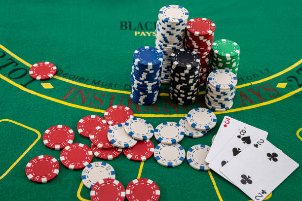 istock various cards with colored chips scattered for a new game of poker 1360196530