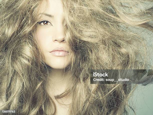 Closeup Of Woman With Long Wavy Blonde Hair Stock Photo - Download Image Now - 20-24 Years, 20-29 Years, Adult