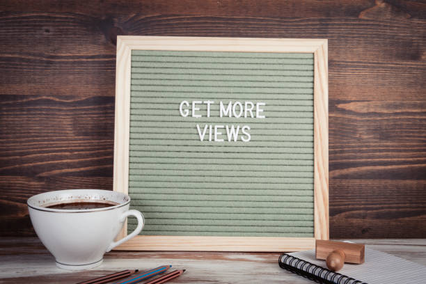 istock Get More Views. English text on a letter Board 1360198282