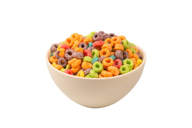 istock Colorful rings cereal spill out into a bowl. Breakfast. Isolated. 1360199342