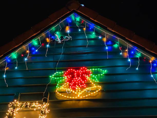 istock Christmas decoration, Lighting on the house gable 1360205315