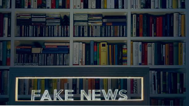 istock Fake news on library background 1360205369