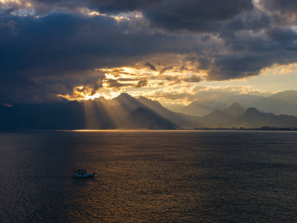 istock a magnificent sunset view from behind the mountains 1360207184