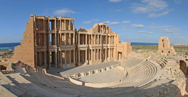 Panoramic view of Roman Theatre of Sabratha, Libya Originally built by Marcus Aurelius in 175-200 A.D., this beautiful theatre was partially reconstructed by the Italians after World War One. libya stock pictures, royalty-free photos & images