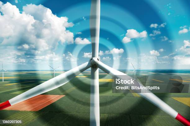 Aerial View Of Wind Turbines On Modern Wind Farm From Drone Pov Digitally Enhanced Image Stock Photo - Download Image Now