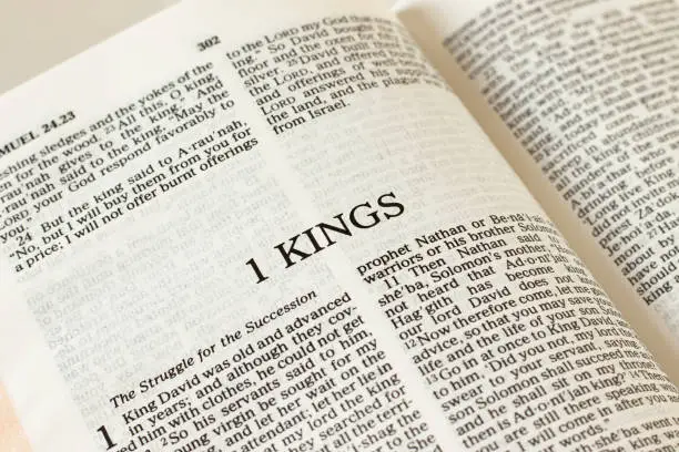 1 Kings open Holy Bible Book. A close-up. Reading and studying Old Testament Scripture. Christian biblical concept. Truth and wisdom from God and Jesus Christ.