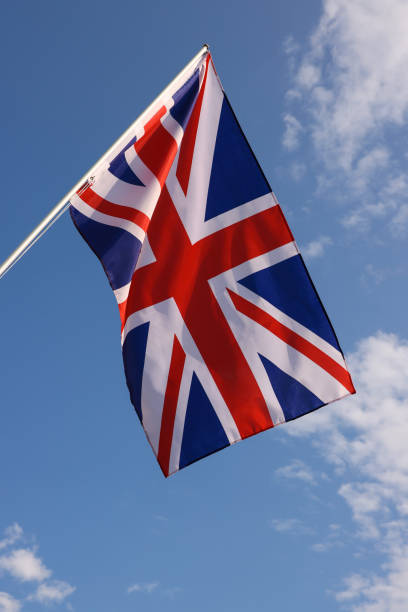 istock UK British flag hanging on flagstaff 1360209655