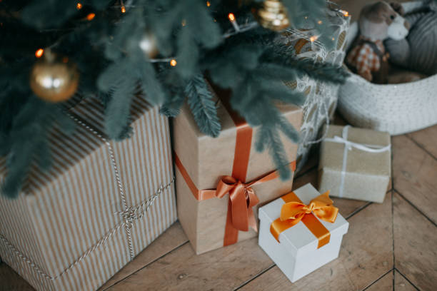 istock Christmas tree and gifts 1360210466