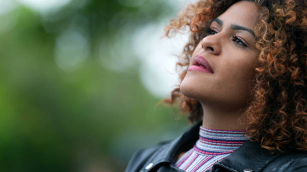 istock Black woman pondering solution to problem. Brazilian girl thinking contemplating solution 1360213152