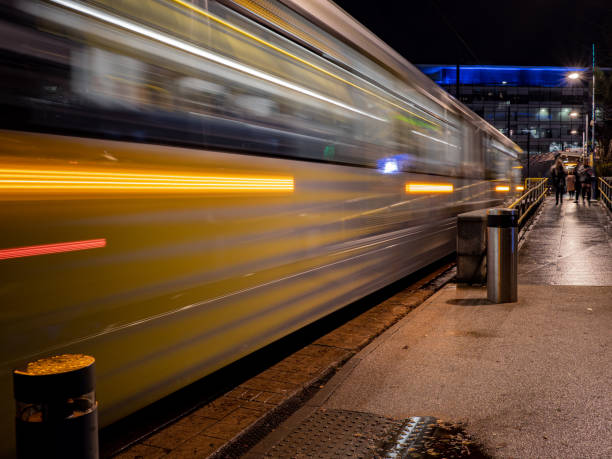 istock long exposure blur of tram leaving station 1360214480