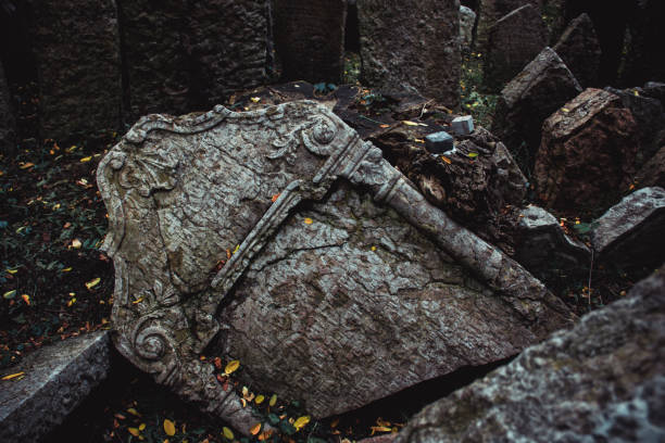 Old Jewish cemetery in Prague. Shattered headstone stock photo