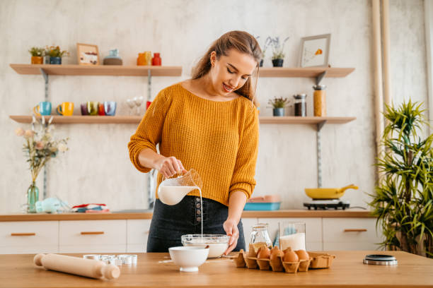 Young Woman Baking Cookies