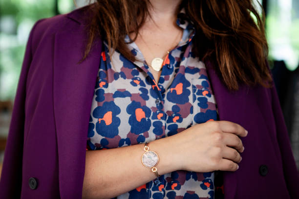 a girl wearing a purple jacket