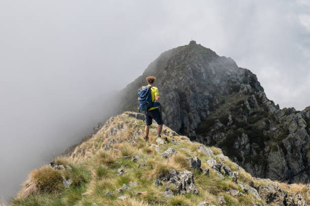 istock hiking in the mountains 1360224012