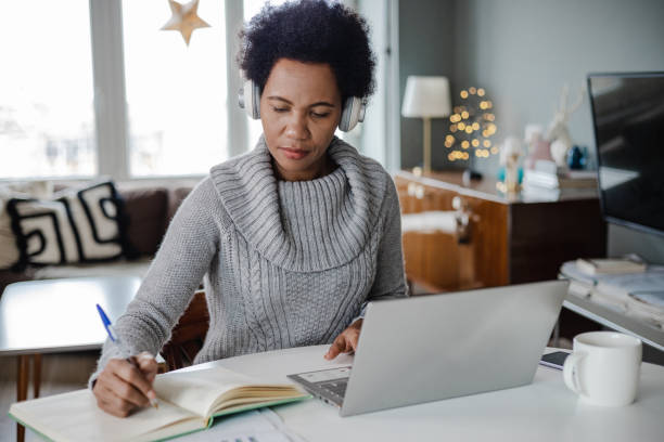 istock African-American attends an online course at home 1360224567