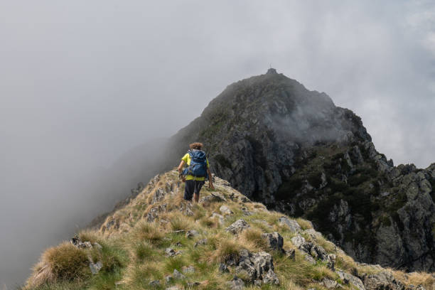 istock hiking in the mountains 1360224813