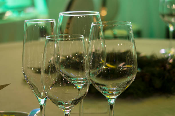 istock Close up picture of empty glasses in restaurant. Selective focus. 1360226323